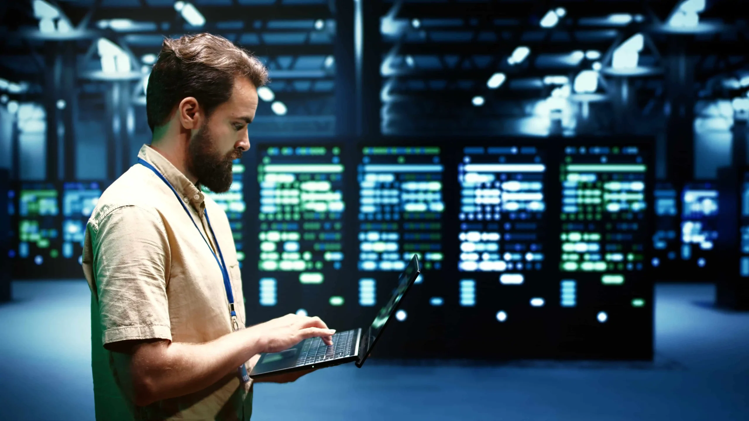 a guy holding laptop looking for the best vps hosting